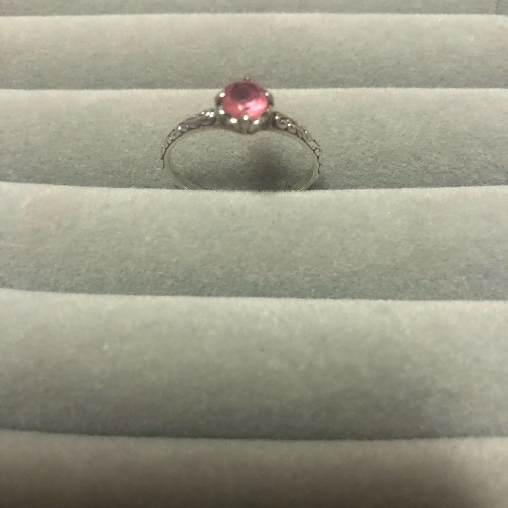 Silver ring with pink stone. Pre owned like new.